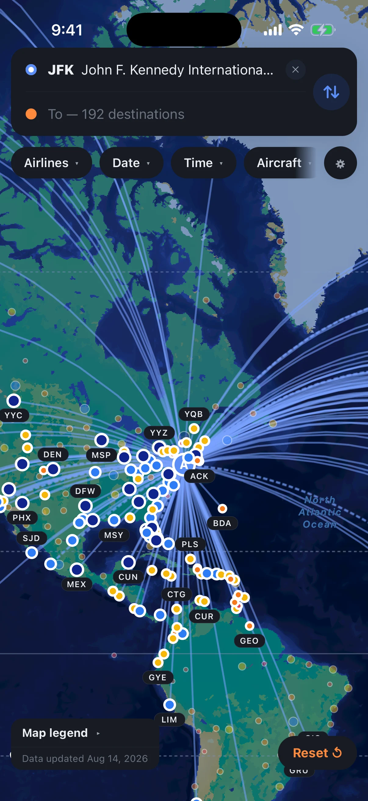 iPhone screenshot: dark world map with blue route arcs fanning out from JFK to 192 destinations, airports marked as colored dots